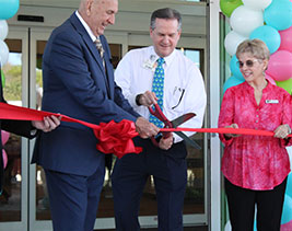 Group of people gathered for the Valencia ribbon cutting ceremony.