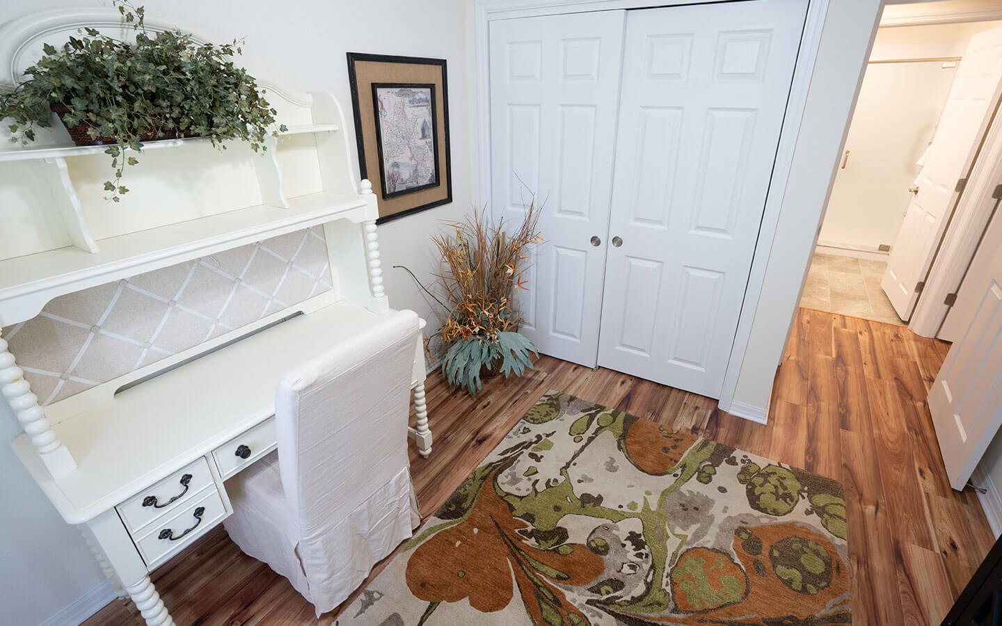 Office with closet and desk