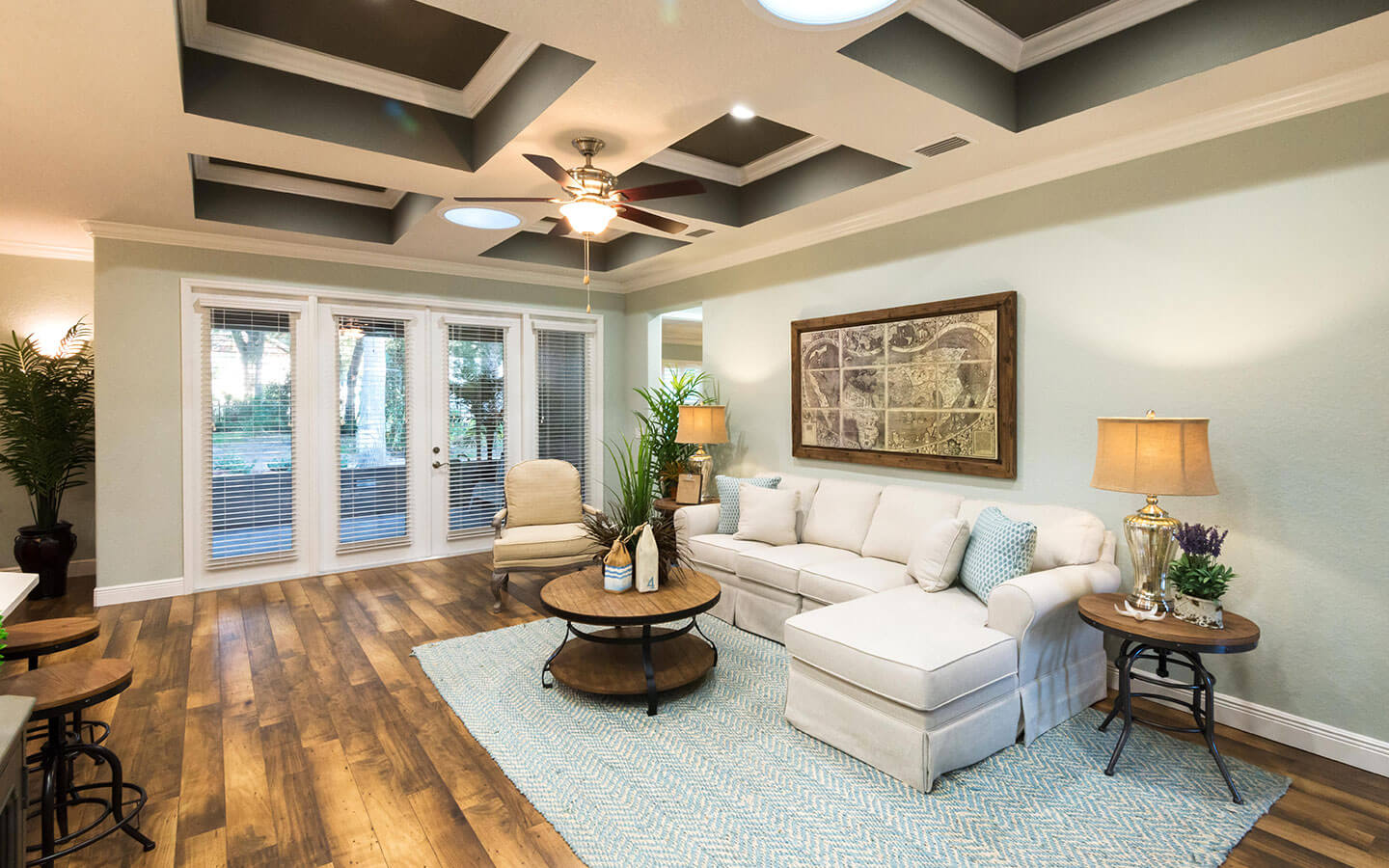 Large living room with L-shaped couch.